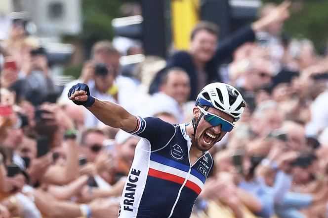 Frenchman Julian Alaphilippe celebrates his victory in the road race of the World Cycling Championships, between Antwerp and Leuven, Belgium, on September 26.