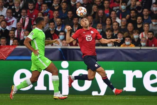 Burak Yilmaz in a duel with Maxence Lacroix, during the draw (0-0) between Lille and Wolfsburg.