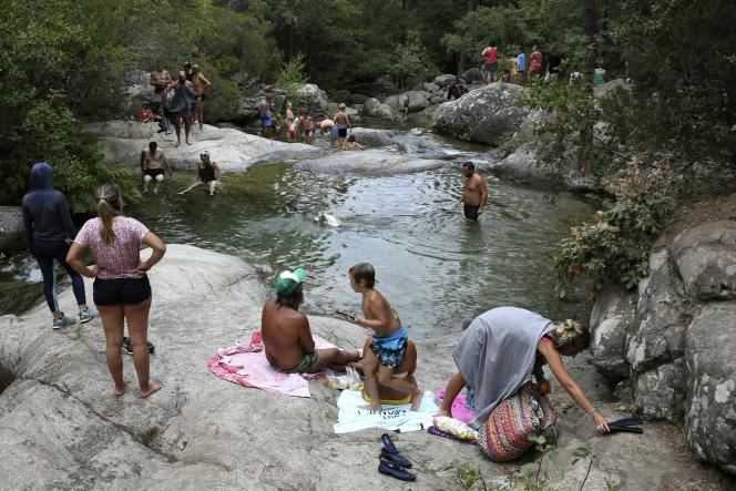 Tourists bathing in the river, below the Col de Bavella near Zonza in Corse-du-Sud, August 25, 2021.