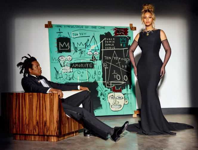 Tiffany & Co stages the stars Jay-Z and Beyoncé in front of “Equals pi”, a painting by Basquiat acquired by Bernard Arnault.  The singer wears the iconic diamond of the American jeweler, owned by the LVMH group.