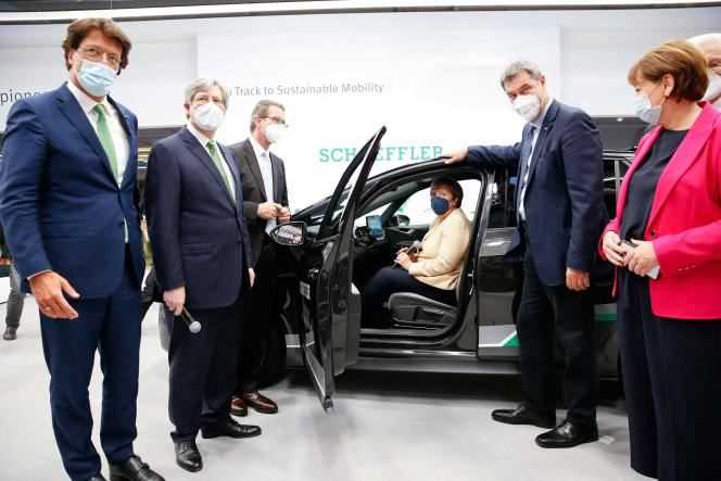 German Chancellor Angela Merkel (center, in the car), at the Munich Mobility Fair (IAA Mobility), September 7, 2021.