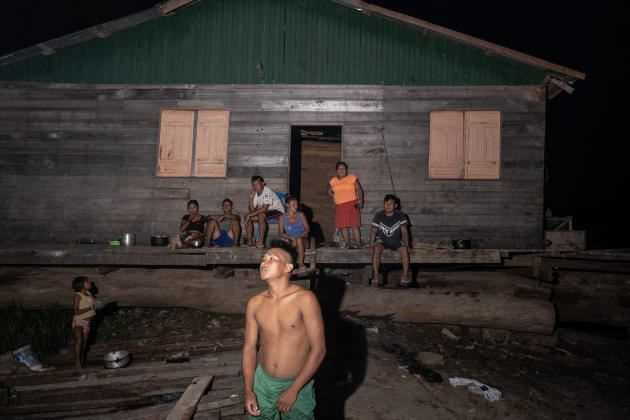 Kanamari natives living in a makeshift camp on the banks of the Javari River in the city of Atalaia do Norte, Brazil, August 15, 2021.