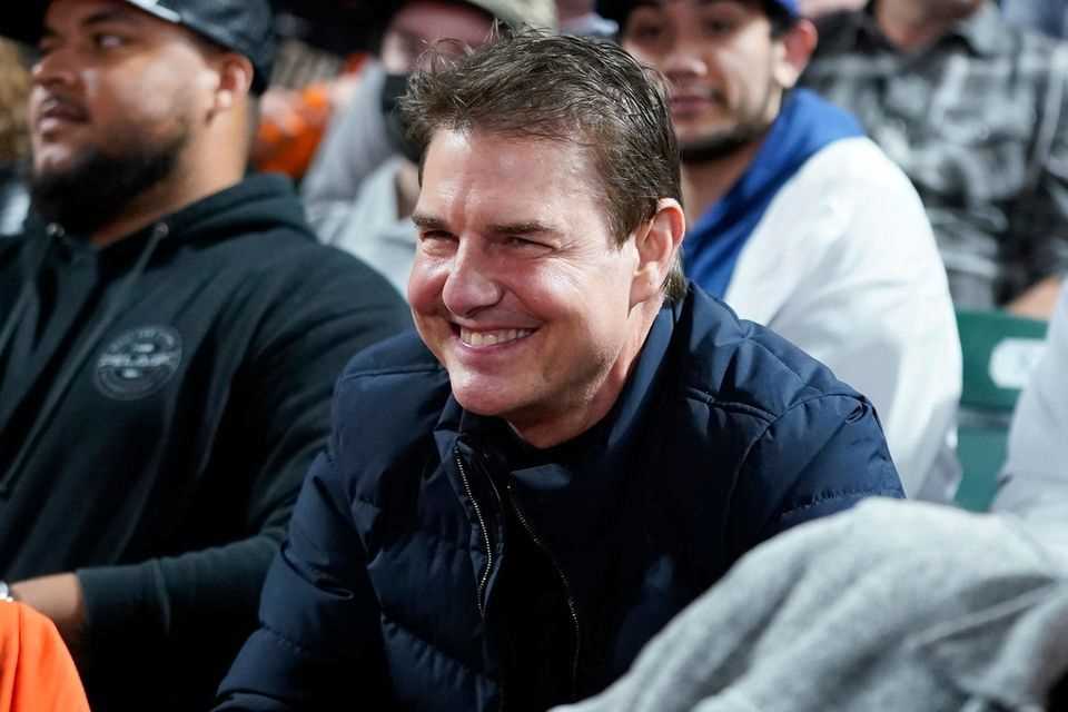 Tom Cruise looked relaxed and happy