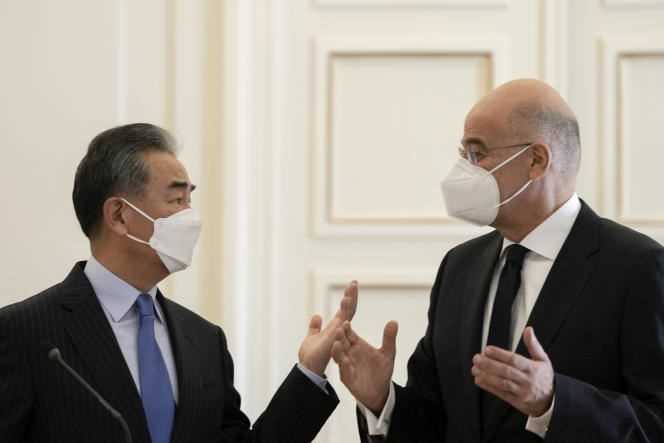 Chinese Foreign Minister Wang Yi and his Greek counterpart Nikos Dendias in Athens on October 27, 2021.