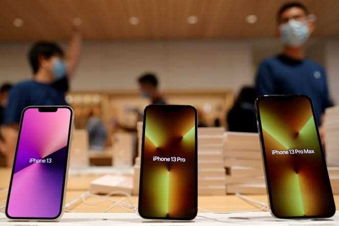 IPhone 13 models on display at an Apple store in Beijing on September 24, 2021.