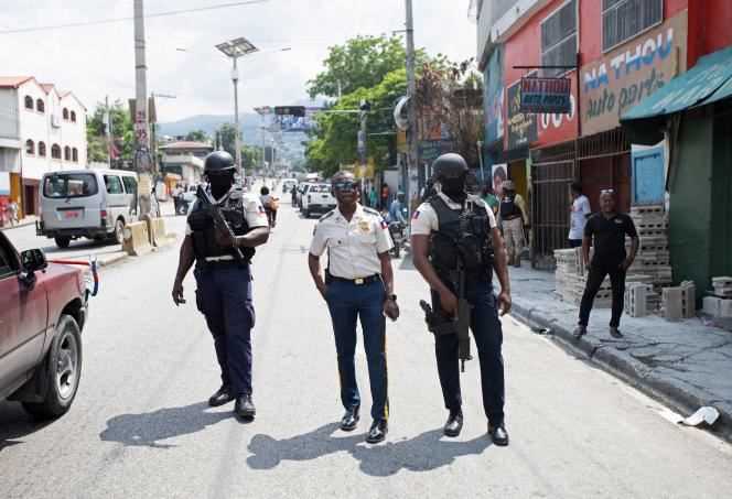 Police patrol the streets of Port-au-Prince, October 17, 2021.