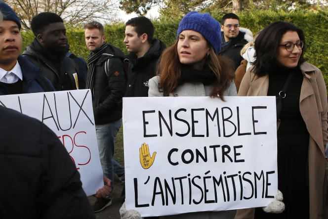 Students during a ceremony in tribute to Ilan Halimi, in Sainte-Geneviève-des-Bois (Essonne), on February 13, 2019, two days after two trees planted in his memory were desecrated.