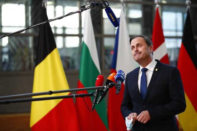 Luxembourg Prime Minister Xavier Bettel addresses journalists upon his arrival at the European Council in Brussels on October 22, 2021.