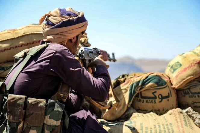 A fighter from troops loyal to the Yemeni government at the front line against Houthi rebels in Marib province, northeast Yemen, October 17, 2021.
