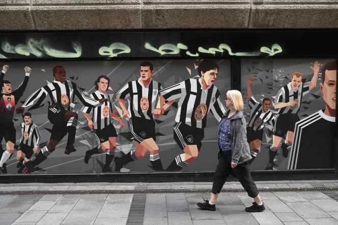In front of a mural in tribute to Newcastle United players, in Newcastle, on October 8.