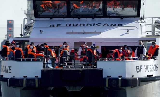 Migrants are driven to Dover on a British Border Force boat after being rescued in the English Channel on Friday, October 8, 2021.