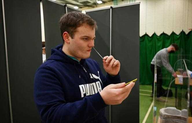 A student is tested for Covid-19 in the gymnasium of Wilberforce College, in Hull (UK), March 8, 2021.