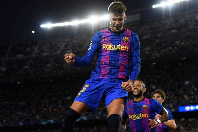 Barca defender Gerard Pique celebrates his goal against Dynamo Kiev at Camp Nou on October 20, 2021.