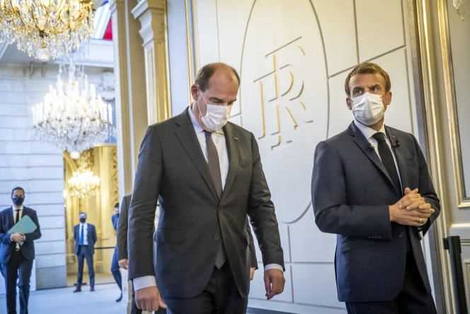 Emmanuel Macron and Jean Castex arrive at the Elysée Palace to present the “France 2030” plan, in Paris, on October 12, 2021.