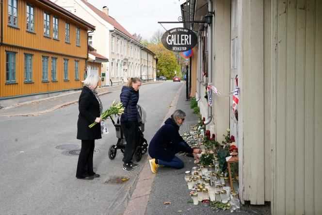 Relatives lay flowers in memory of the five victims of the attack in Norway on Wednesday.