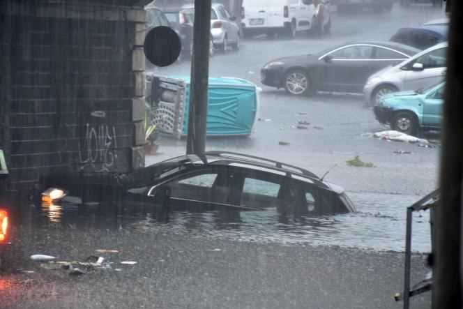 A submerged car after torrential rains, in Catania (Italy), October 26, 2021.