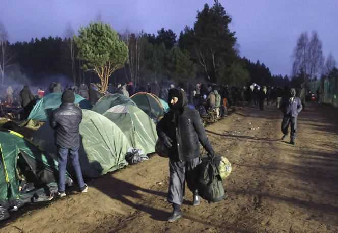Migrants at the Kuznica crossing point on the Belarus-Poland border near the Belarusian town of Grodno on November 18, 2021.