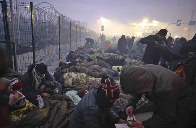 Migrants from the Middle East stranded and gathered at the Kuznica checkpoint on the Belarus-Poland border, Monday, November 15, 2021.