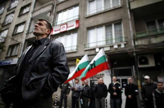 The leader of the Bulgarian National Union (far right), Boyan Rasate, in front of the building of the Turkish ethnic Bulgarian party, the Movement for Rights and Freedoms, in central Sofia, on November 9, 2008.