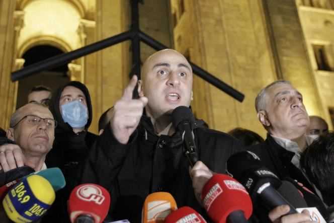 Nika Melia, leader of the main opposition United National Movement, addresses supporters gathered to protest against the results of the municipal ballot in front of the Parliament of Tbilisi, Sunday, October 31, 2021.