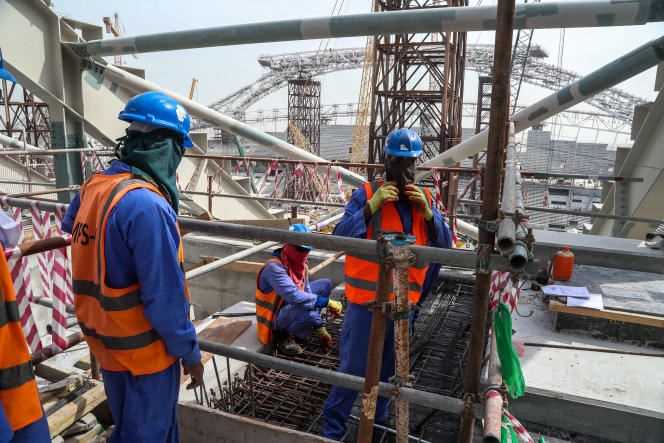 Workers, in February 2018, during the construction of the Al-Wakrah stadium.