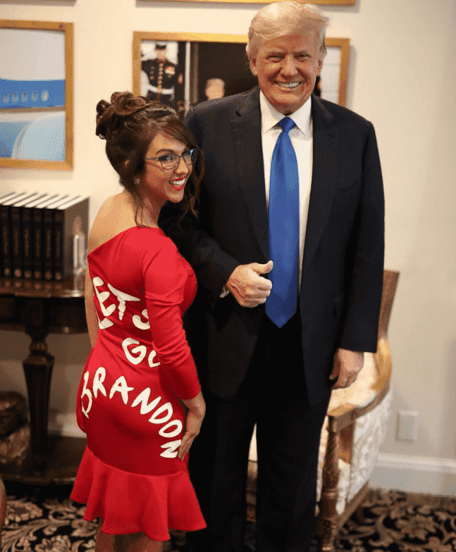 MP Lauren Boebert wears a dress with the message “Let's go Brandon” during her meeting with Donald Trump, in Mar-a-Lago, Florida, on November 4, 2021.