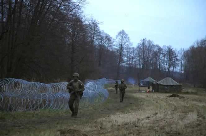 Polish soldiers patrol the border between Poland and Belarus, Wednesday, November 10, 2021.
