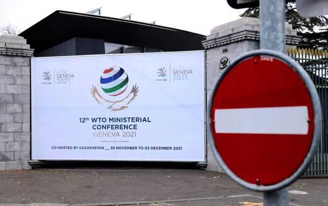 A sign announcing the 12th Ministerial Conference, at the headquarters of the World Trade Organization in Geneva, Switzerland, November 25, 2021.