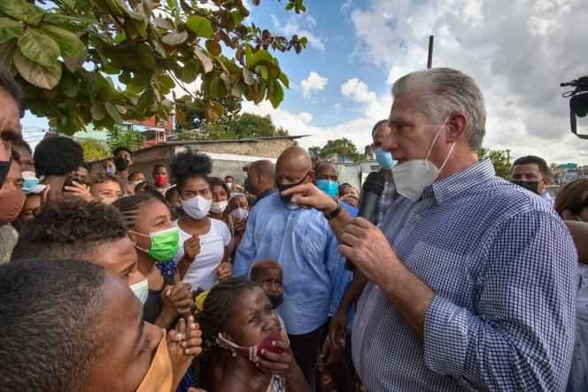 Cuban President Miguel Diaz-Canel visits the Los Pocitos neighborhood in Marianao, one of Havana's municipalities, on November 12, 2021.