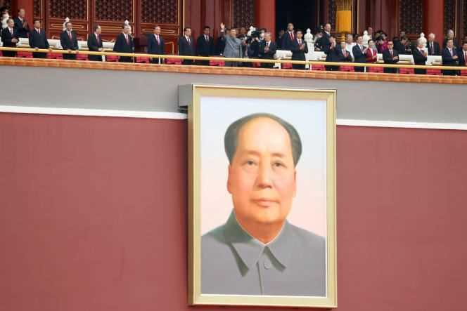 Chinese President Xi Jinping above a giant portrait of Mao Zedong during the 100th anniversary of the Communist Party, Tiananmen Square, Beijing, July 1, 2021.