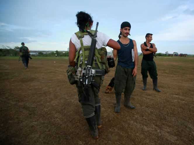 FARC fighters arrive at the camp where they prepare to ratify the peace agreement with the Colombian government, near El Diamante, in the Yari Plains, Colombia, September 16, 2016.