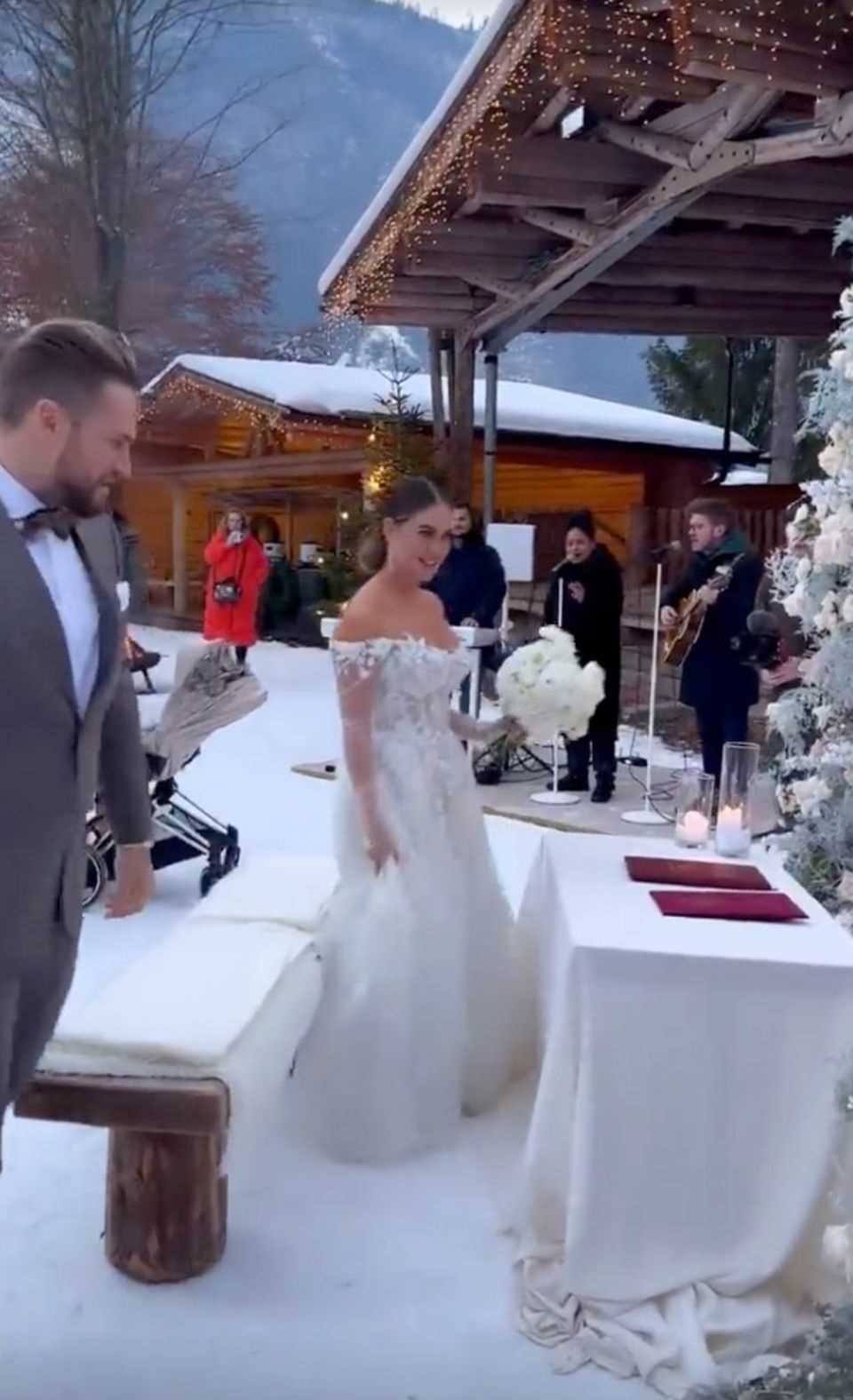 Jessica Paszka looks like an ice queen in her wedding dress. 