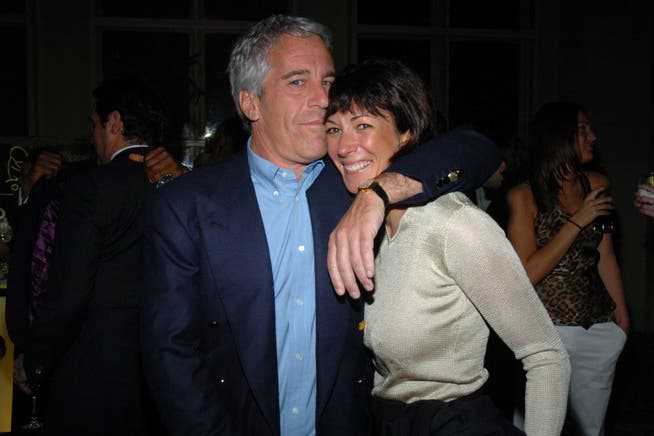 Convicted sex offender Jeffrey Epstein and his alleged accomplice Ghislaine Maxwell at a Wall Street fundraiser in 2005.