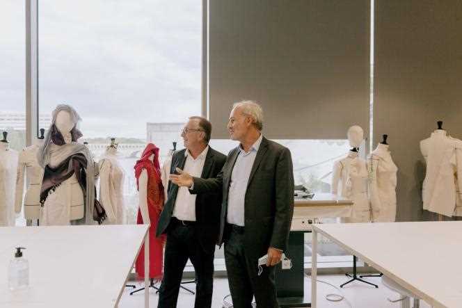 Bruno Pavlovsky, president of fashion activities at Chanel (left), and Xavier Romatet, director general of IFM (right), in the workshops of the Institut français de la mode, in Paris, in September 2021.