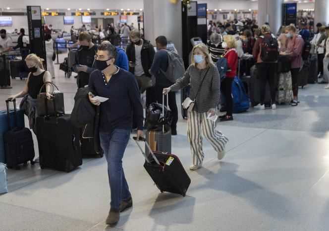 Miami Airport (Florida) is full of travelers on December 23, 2021.