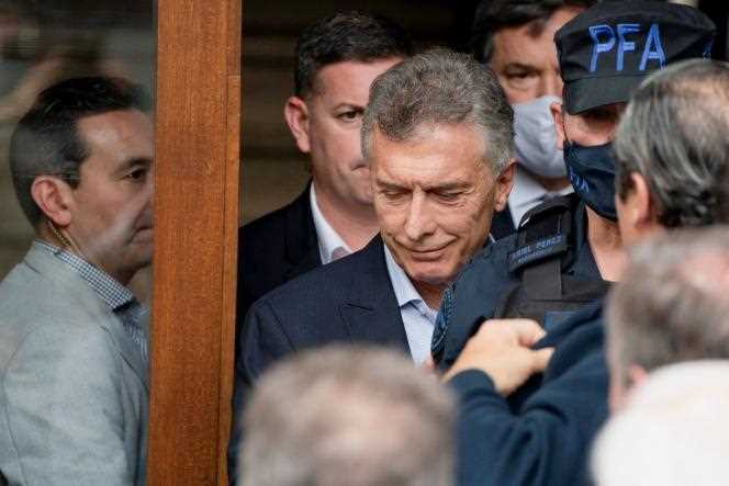 Former Argentine President Mauricio Macri leaves the federal court in Dolores, a suburb of Buenos Aires, on November 3, 2021, after being summoned for cases of alleged espionage of the families of the victims of the 