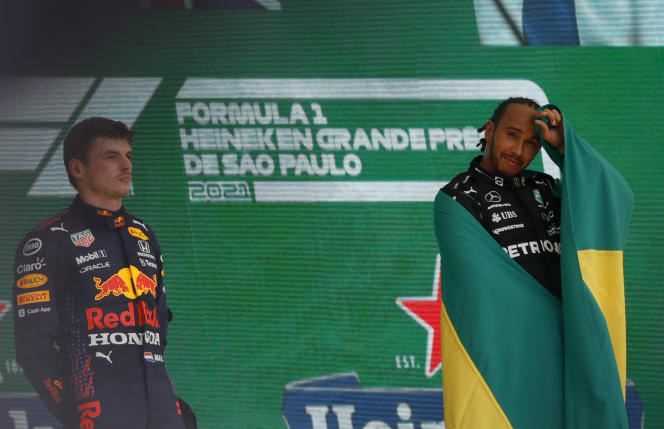 Lewis Hamilton (right) and Max Verstappen, on the podium at the Brazilian Grand Prix on November 14.