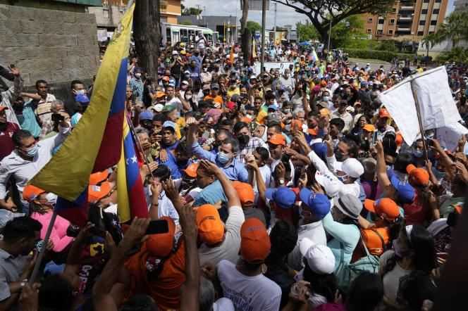 Venezuelan opposition leaders Juan Guaido and Freddy Superlano, among crowds of demonstrators, in Barinas, December 4, 2021.