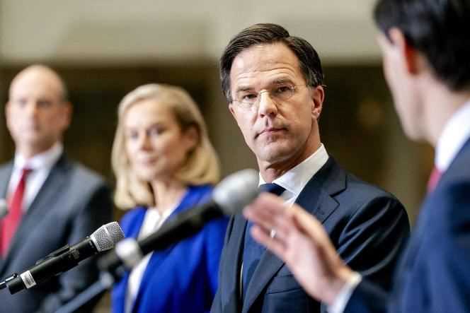 Mark Rutte (center), and the leaders of VVD, D66 and CDA, announce the coalition agreement of government parties, in The Hague, on December 15, 2021.