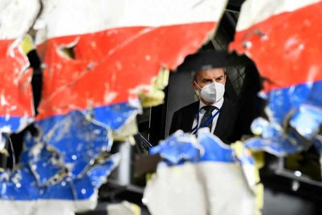 Deputy Judge Daan Glass inspects the reconstruction of the wreckage of the MH17, in Rijen (the Netherlands), on May 26, 2021.