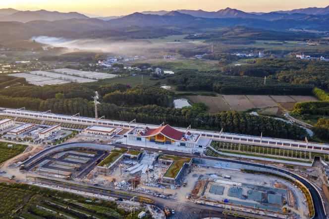 In this photo released by Xinhua News Agency, an aerial view of Ganlanba Station, one of the stations along the new China-Laos railway line, September 28, 2021, in Yunnan Province. (southwest China).