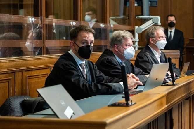 Defense lawyers (left to right) Christian Koch, Ingmar Pauli and Robert Unger, at the verdict delivered at the Higher Regional Court in Berlin on December 15, 2021, in the murder of Zelimkhan Tornike Khangochvili.