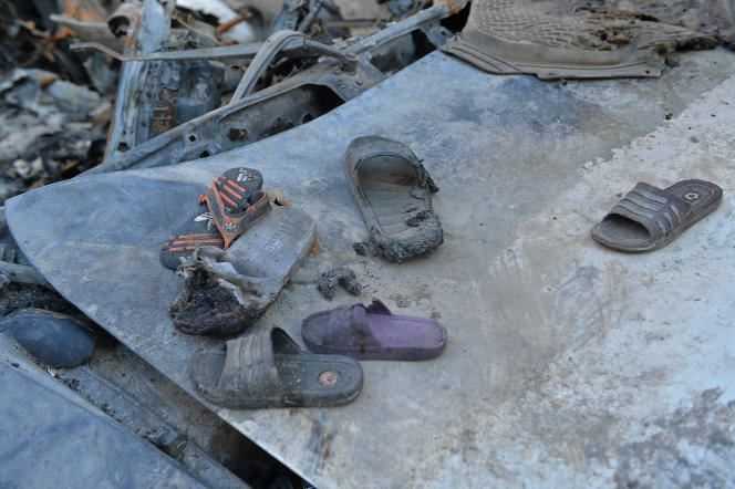 Partially burnt shoes in the rubble of the house damaged on August 29 by a drone strike by the US military in Kabul.