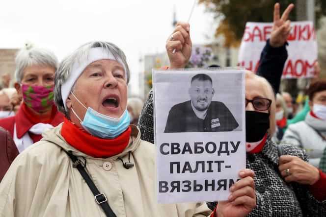 Belarusians demonstrate to demand the release of political prisoners, including Sergei Tsikhanovsky (pictured), in October 2020.