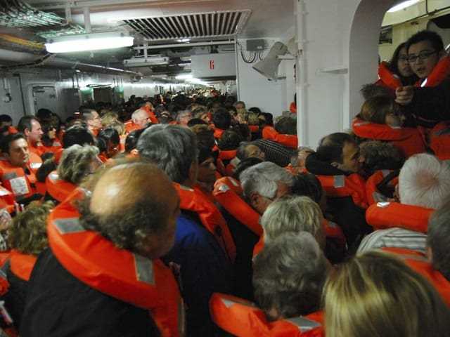 Passengers with life jackets on the Costa Concordia.