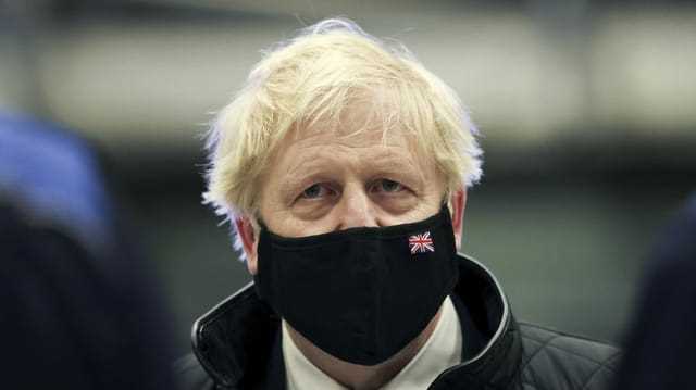 Boris Johnson mit Schutzmaske.