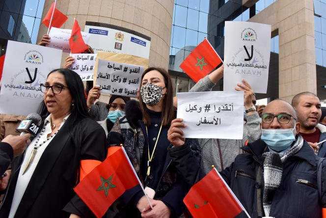 Tourism sector professionals demonstrate against the closure of Moroccan borders in Rabat on January 4, 2022.