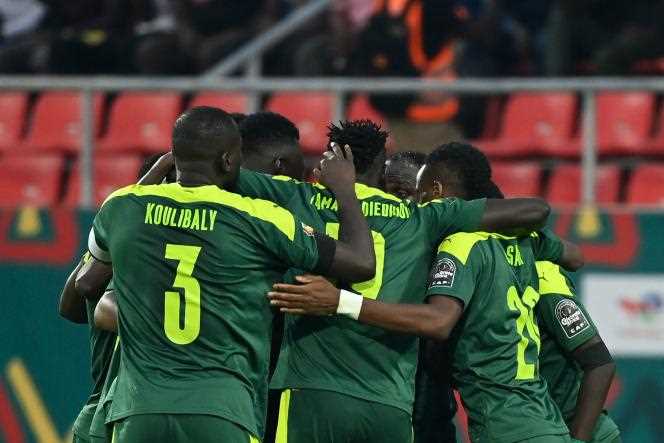 Senegal players celebrate their victory against Cape Verde, Tuesday, January 25, 2022, in Bafoussam, Cameroon.