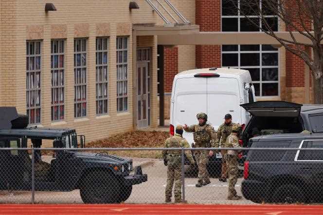 Police forces are deployed near the Congregation Beth Israel Synagogue in Colleyville, Texas, where a hostage situation is underway, January 15, 2022.