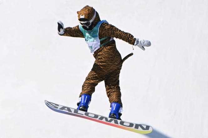 The French Lucile Lefevre disguised as a tiger during the big air qualifications, Monday February 14, 2022, in Beijing.